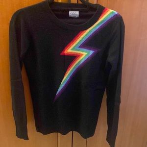 Madeleine Thompson black with rainbow thunderbolt sweater